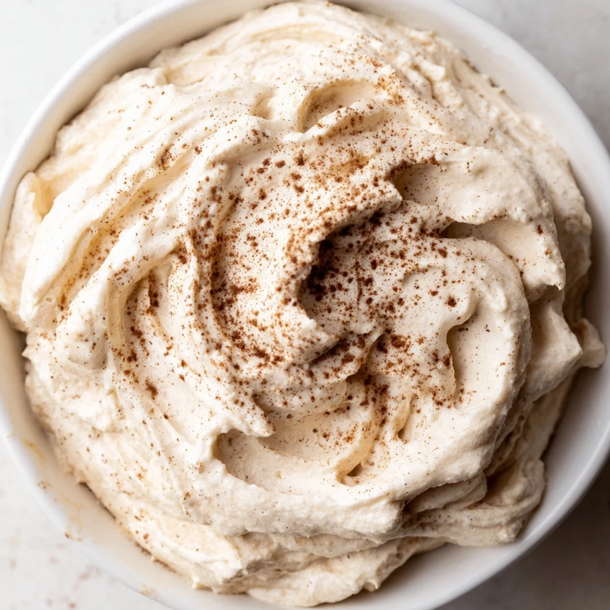 Creamy spiced pumpkin coffee whip dip served with crunchy apple slices.  