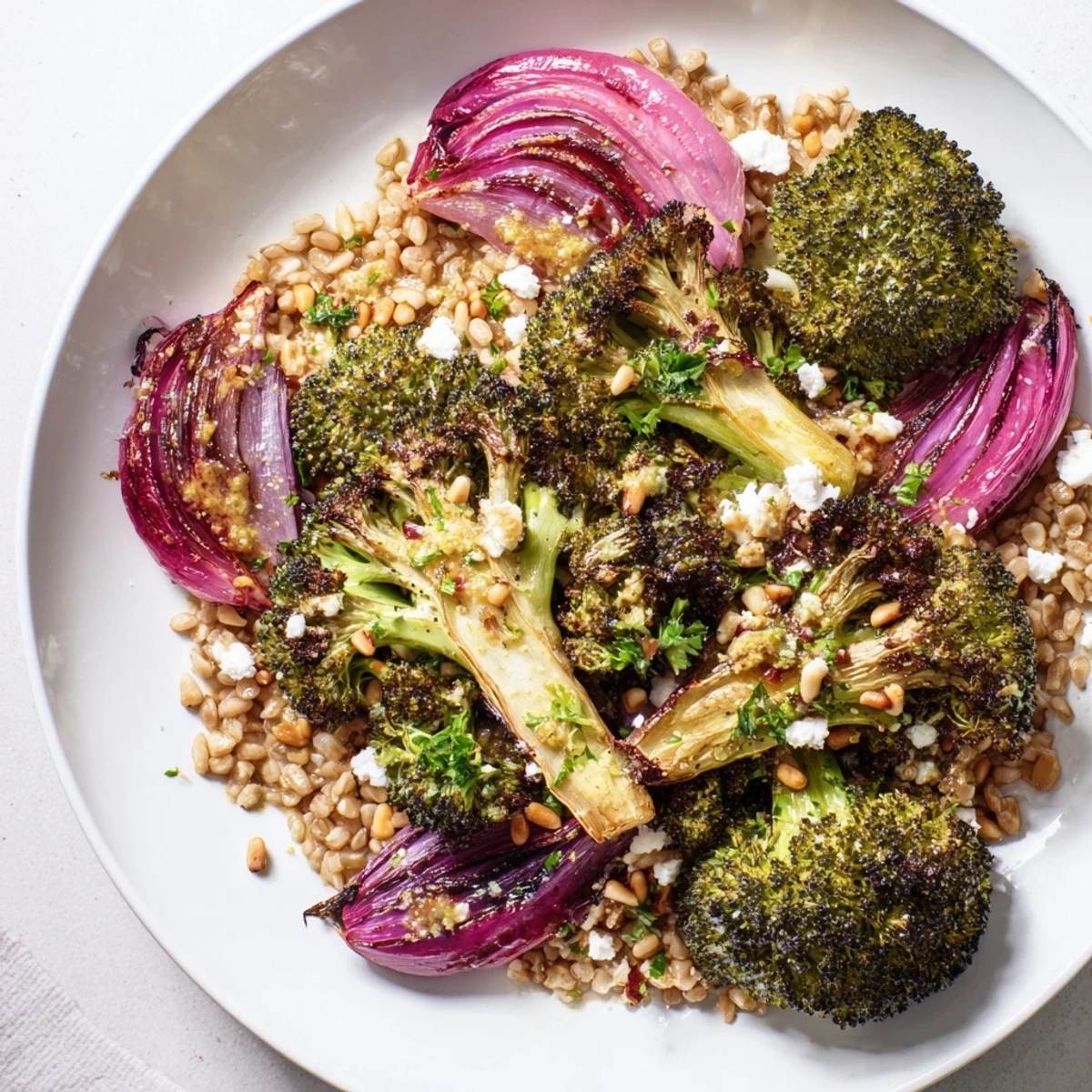 Vibrant image of Warm Roasted Broccoli with Garlic-Lemon & Farro, ready to enjoy as a flavorful Mediterranean meal.