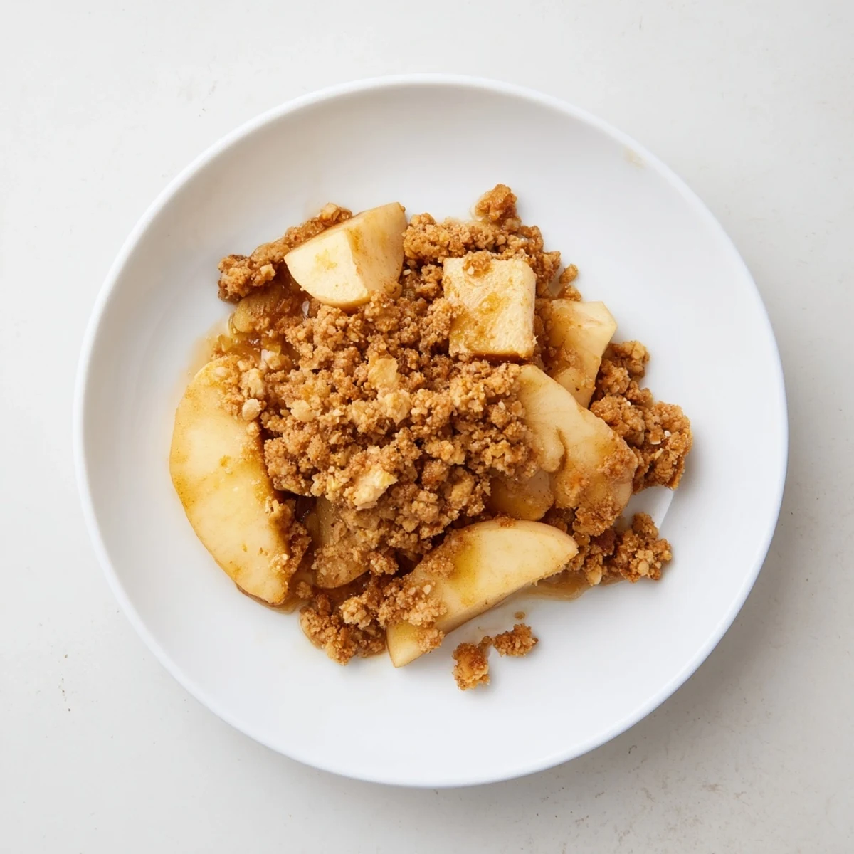 Golden-brown Best Apple Crisp bubbling, with cinnamon-spiced apples ready to be served warm.