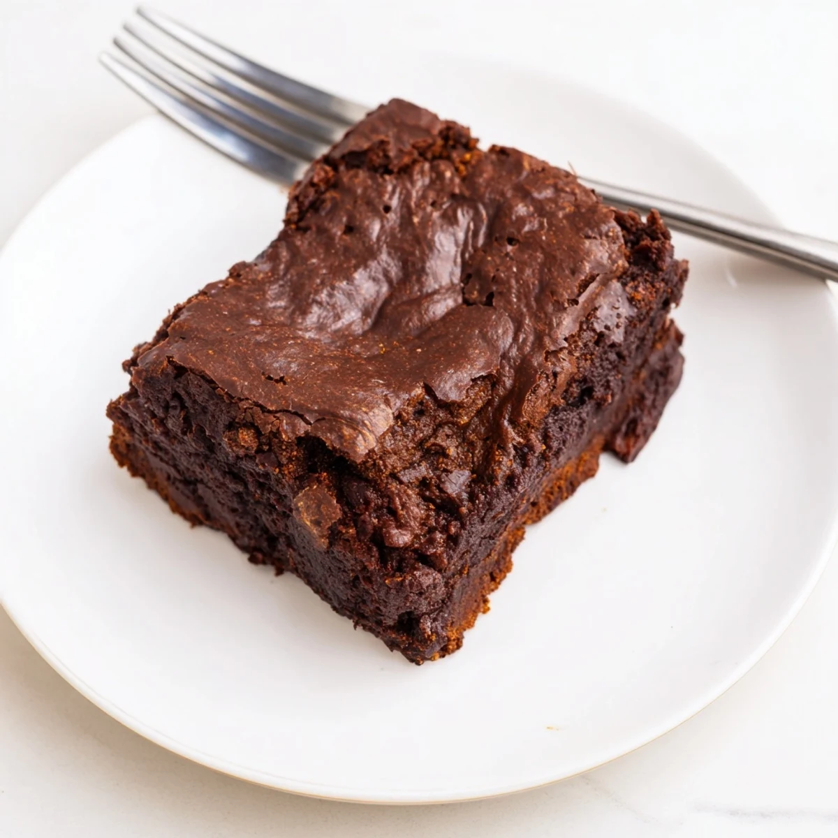 Warm, rich Pumpkin Workout Brownies: a delicious, healthy snack with hints of pumpkin and chocolate.