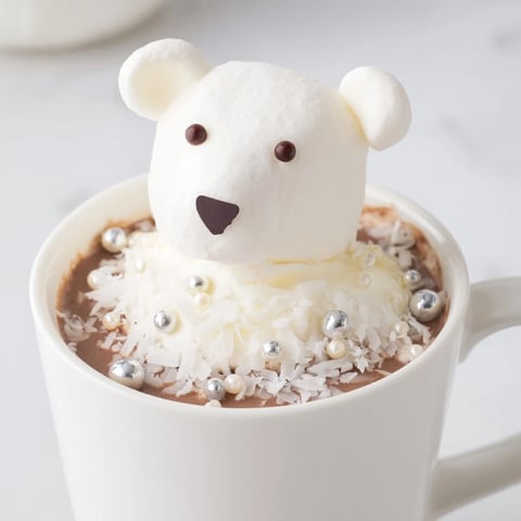 Steaming mugs of Polar Bear Hot Chocolate, a creamy winter dessert with cute marshmallow bears!