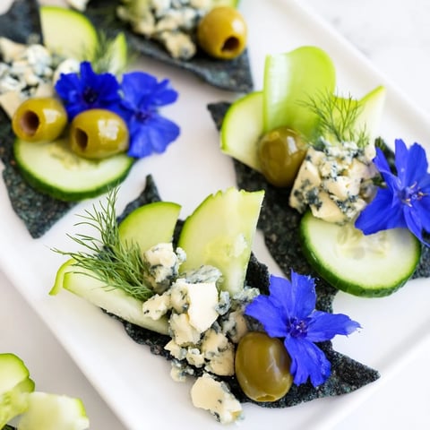 Deep Sea Ocean Wave appetizer platter overflowing with fresh green and blue ingredients, ready to enjoy.