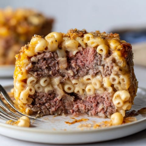 Warm, savory &quot;Mac and Cheese Meatloaf Muffins&quot; &ndash; a comfort food twist on classic meatloaf.