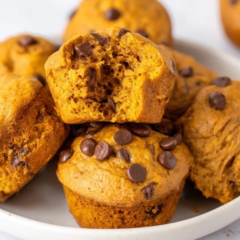 Deliciously fluffy Sweet Potato Pumpkin Chocolate Chip Muffins, perfect for cozy mornings!  