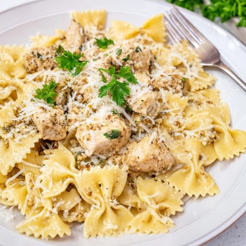 Melted mozzarella blankets flavorful Mozzarella Garlic Butter Chicken Bowties, a satisfying Italian-American comfort food.