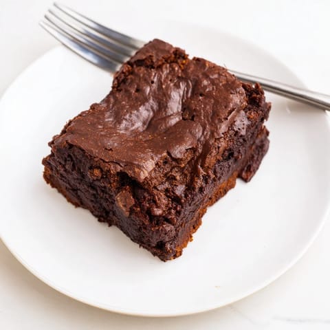 Warm, rich Pumpkin Workout Brownies: a delicious, healthy snack with hints of pumpkin and chocolate.