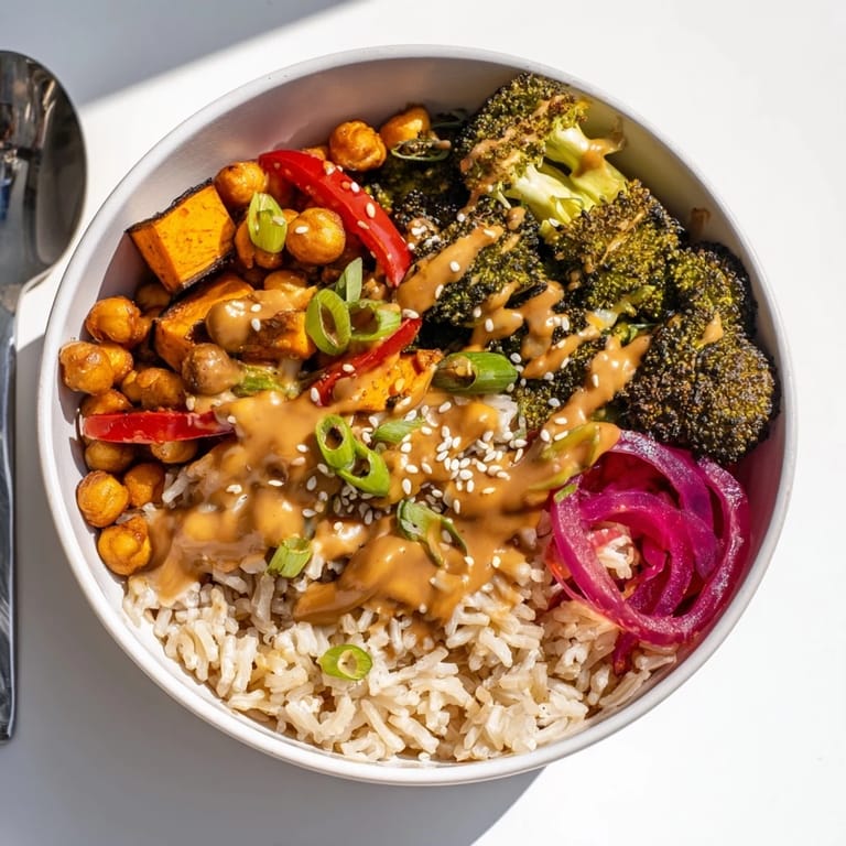 Delicious grain bowls with colorful veggies, miso-butter, and gochujang-maple sauces.  