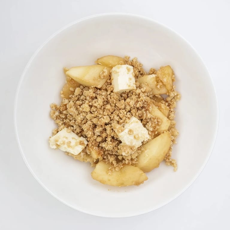 Warm and delicious homemade Best Apple Crisp, perfect for a cozy fall dessert with ice cream.