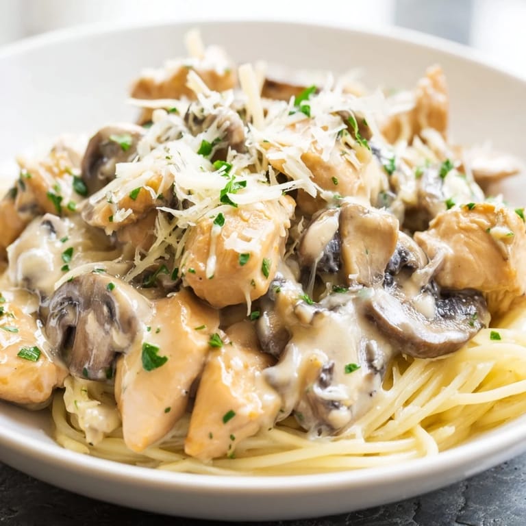 Savory Creamy Mushroom Chicken Pasta, with tender chicken and mushrooms in a creamy sauce, ready to enjoy.